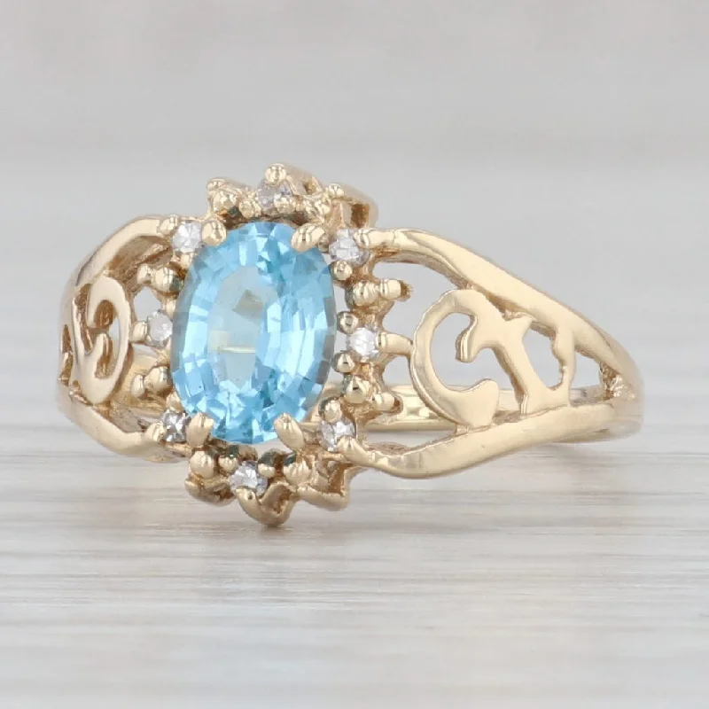 unique gemstone engagement rings for women-0.90ct Oval Blue Topaz Diamond Halo Ring 14k Yellow Gold Size 5.25