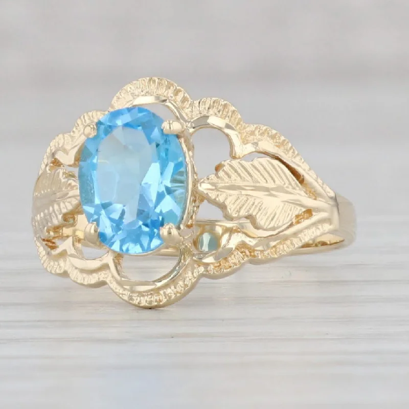 oval diamond engagement rings for women-1.48ct Oval Blue Topaz Solitaire Floral Ring 14k Yellow Gold Size 7